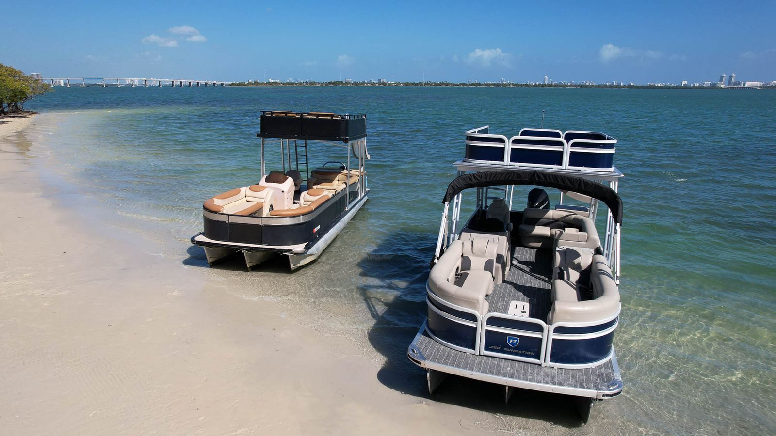 Tritoons anchored at a sandbar island